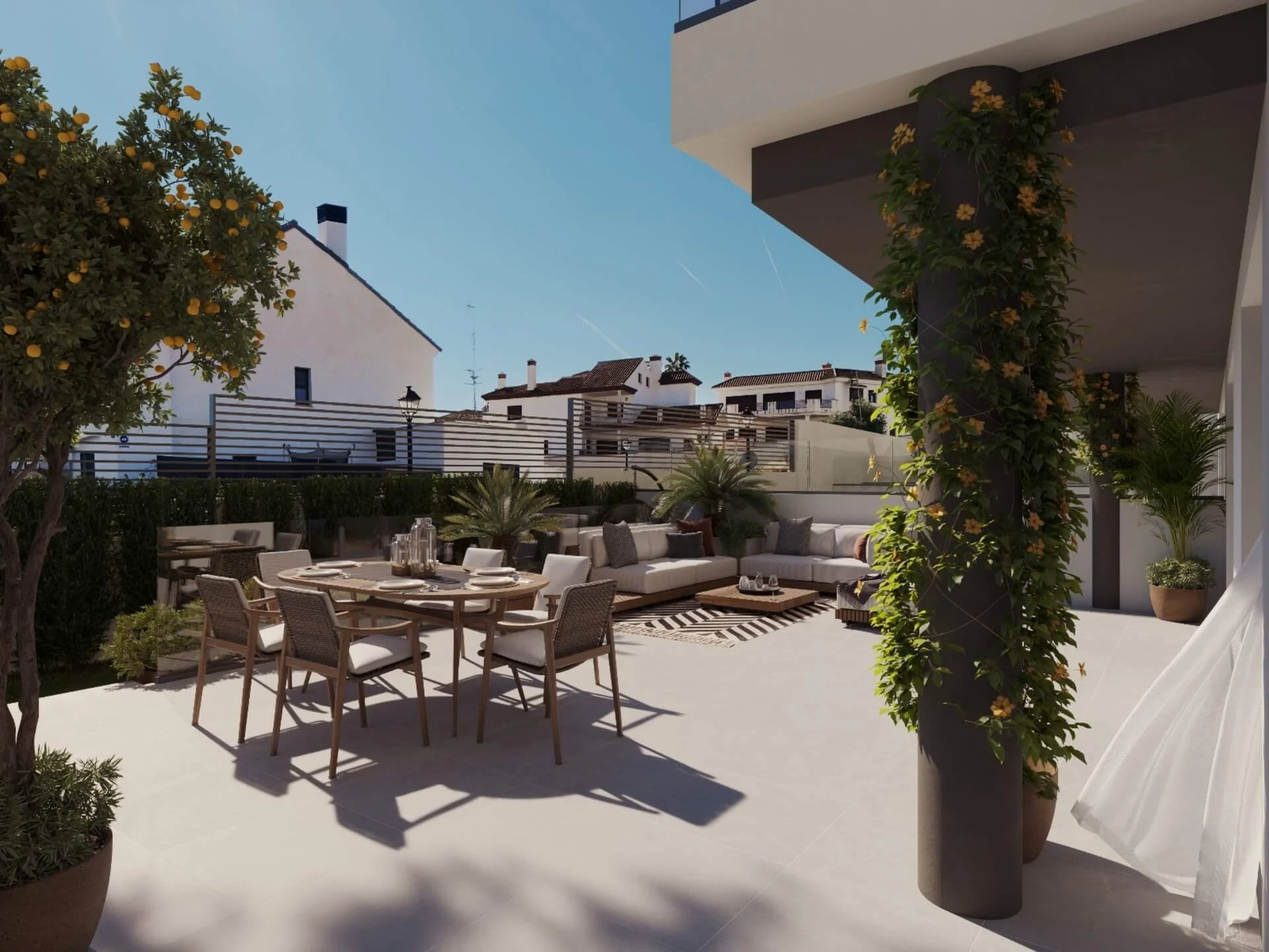 Gelijkvloers terras met eettafel en loungezetels
