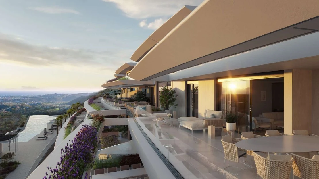 Terras van de woning met zithoek en zeezicht