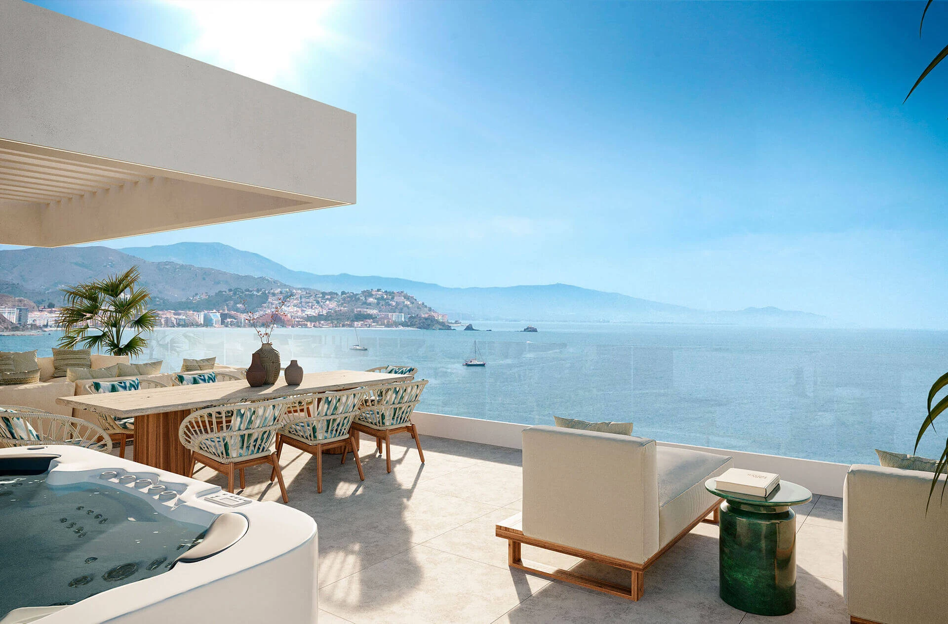 Solarium met jacuzzi en zicht over de baai van La Herradura