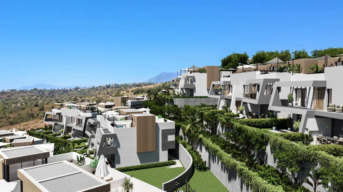 Complex van bovenaf met panoramisch zeezicht en groene omgeving